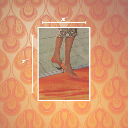 A framed art print or photo insert shown on a retro patterned orange and beige background, with white measurement lines indicating 5 inches wide by 7 inches tall. The central artwork shows a cropped scene of a person's legs in patterned skirt and pointed heels standing on a red-orange surface.