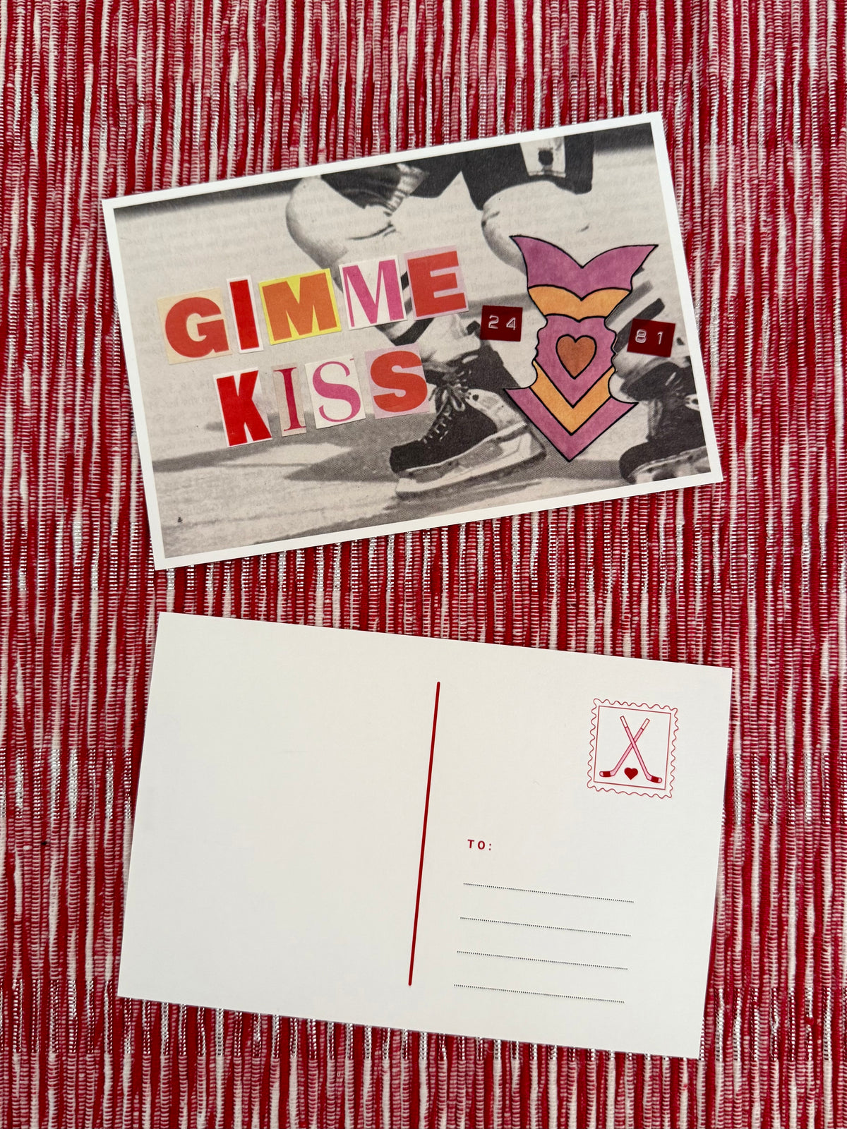 Gimme Kiss postcard next to the blank back, showing a hockey stick stamp design